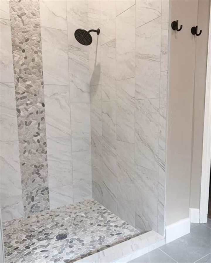 Can you tile over shower liner?