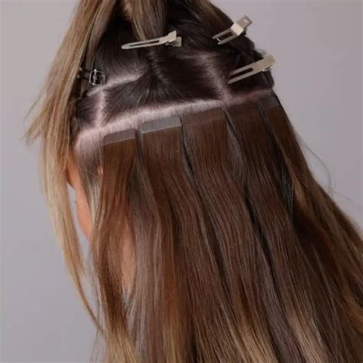 How do you remove old tape in extensions?