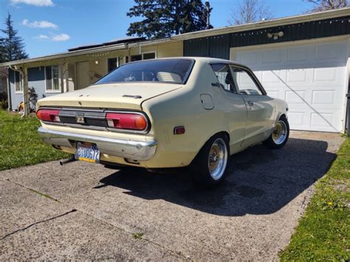 Who made the Datsun b210